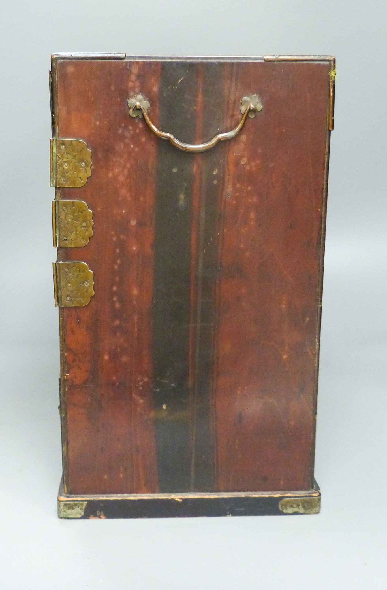 A Japanese lacquer and abalone inlaid table cabinet, 36.5cm wide